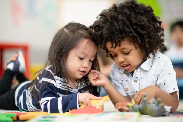 istock Preschoolers on the carpet 1285329445