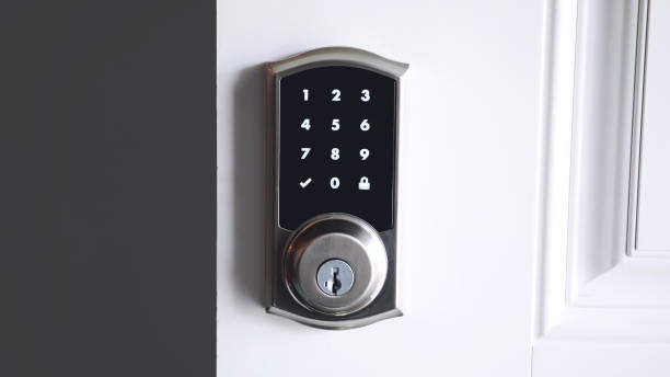 Digital smart door lock security system with the password Digital smart door lock security system with the password, close up on numbers on the screen. fingerprint scanner photos stock pictures, royalty-free photos & images