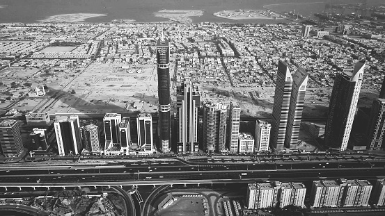 Sheikh Zayed Road Skyscrapers buildings with Dubai Metro visible, E11, Dubai, United Arab Emirates, UAE, black and white