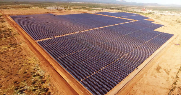 istock solar power panels farm in the desert. 1285331797
