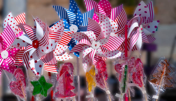 istock Children's plastic wind mills and candy of various shapes 1285332230