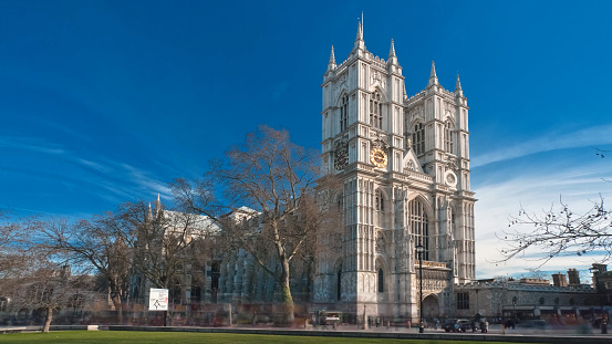 Westminster Abbey Cathedral in London England during the Day Blue Sky and Clouds