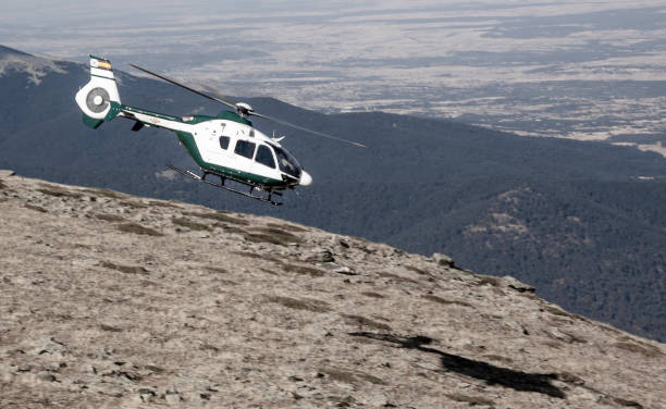 istock Mountain rescue helicopter, people rescue operation 1285333496