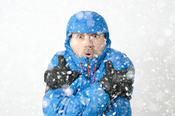 istock Portrait of man freezing under snowfall 1285334438