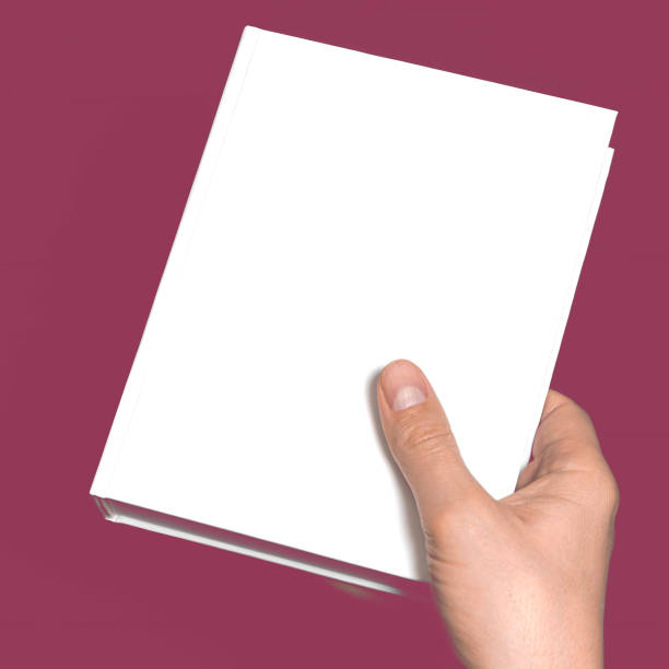 istock A mock-up of a white closed book with a place for text in a hand 1285337797