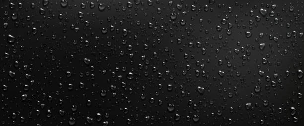 Condensation water drops on black glass background Condensation water drops on black window background. Rain droplets with light reflection on dark glass surface, abstract wet texture, scattered pure aqua blobs pattern Realistic 3d vector illustration black glass surface stock illustrations
