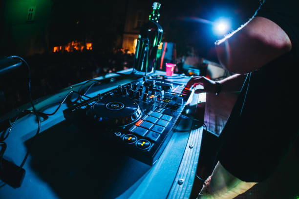 istock DJ playing and mixing music at party 1285342904