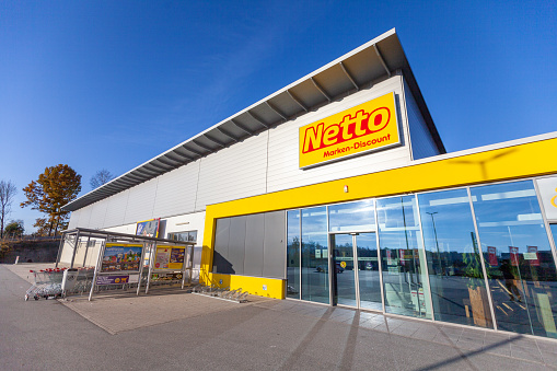 Passau / Germany - November 8, 2020: Branch logo of Netto. Netto Marken-Discount is a German discount supermarket chain.