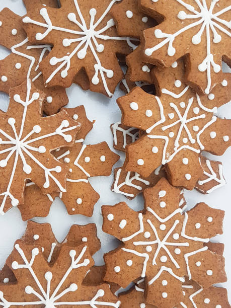 istock Snow shaped cookies on white background. 1285350068