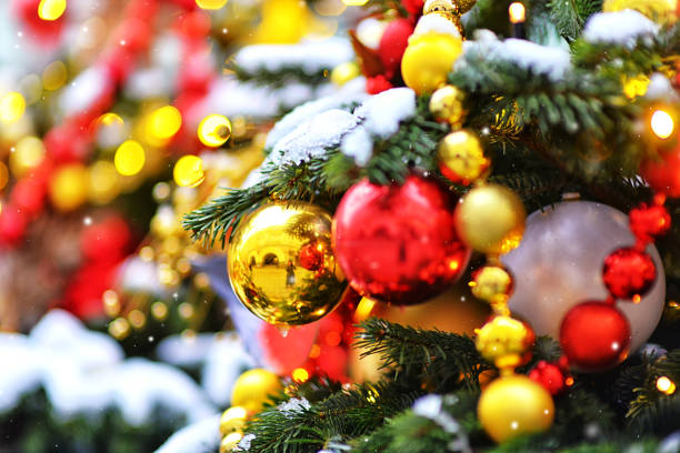 istock Christmas decorations on the branches of a Christmas tree covered with snow 1285352319