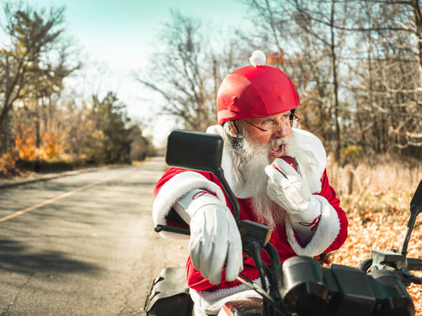 istock Santa Claus taking a break on the road 1285354646