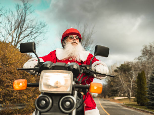 istock Santa Claus on motorbike 1285355125