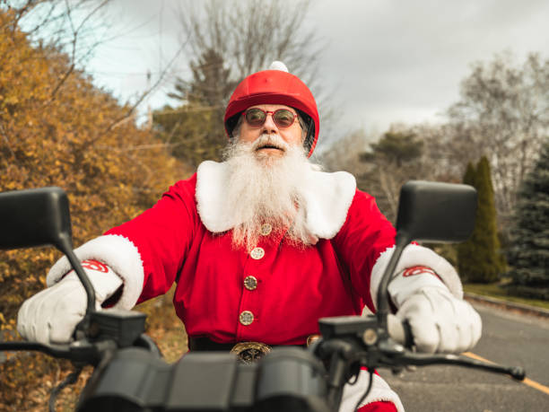 istock Santa Claus on motorbike 1285355127