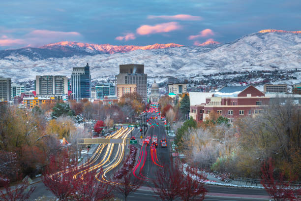 Boise Downtown at dusk, The State Capital of Idaho Downtown Boise, Idaho USA at dusk with traffic long exposure. boise river stock pictures, royalty-free photos & images