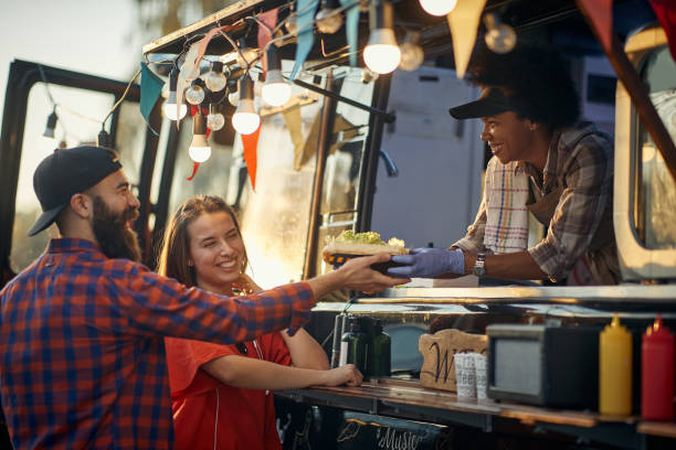 istock group of  multiethnic people having fun at fast food service 1285357088