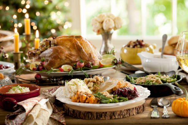 Thanksgiving Dinner Table Elegant Thanksgiving Dinner sauces table turkey christmas stock pictures, royalty-free photos & images