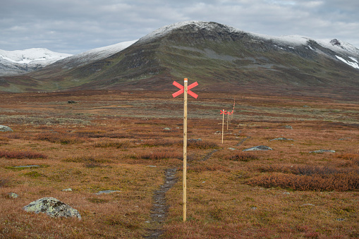 Winter trail markers marking Kungsleden Trail north of Ammarnäs, Lapland, Sweden in Ammarnäs, Västerbotten County, Sweden