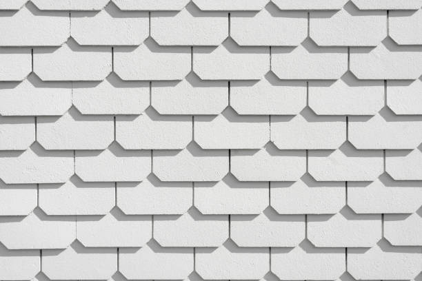 istock White painted slate at house - white slate facade background 1285367457