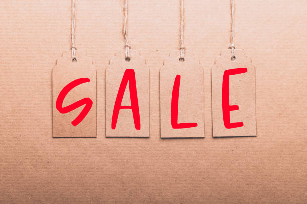 istock Word sale written on paper tags 1285369685