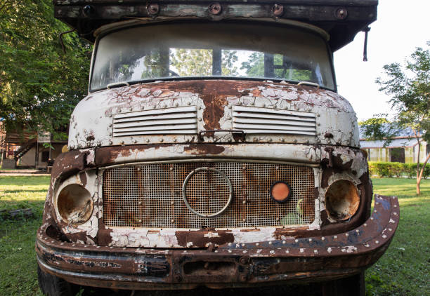 istock Front view of Rusty old logging truck. Abandoned car. 1285370838