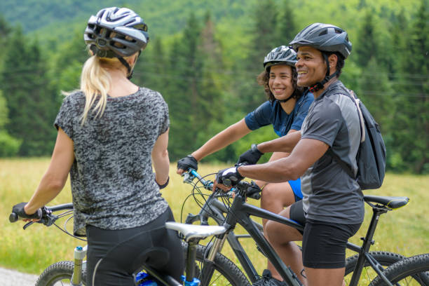 istock Family talking while starting their bike trip 1285372549