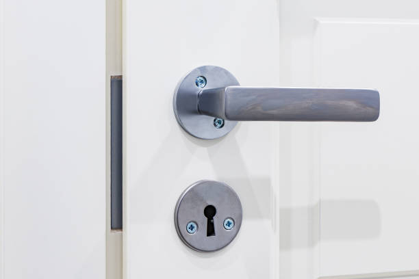 istock Closeup of metal doorhandle. 1285377059