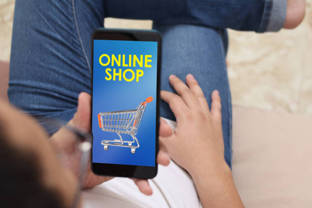istock Man using smart phone, online shopping displayed on the screen, big sale, buying on internet store 1285378620