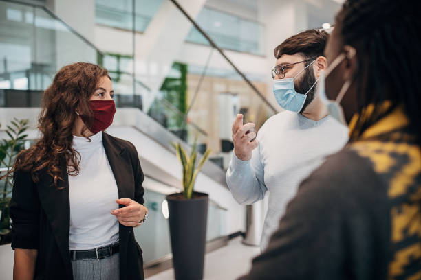 istock People talking in modern firm building lobby 1285385190