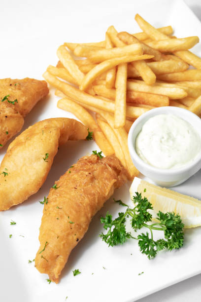istock british traditional fish and chips meal on white plate 1285385897