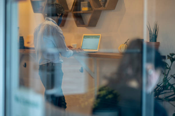 istock Patrons wearing masks at a cafe 1285387473