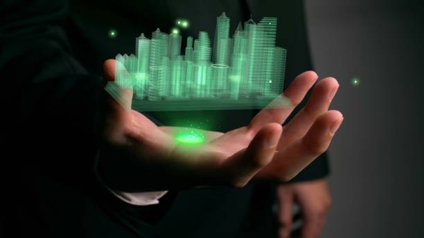 istock Businessman holds 3D city model showing augmented reality technology 1285389239