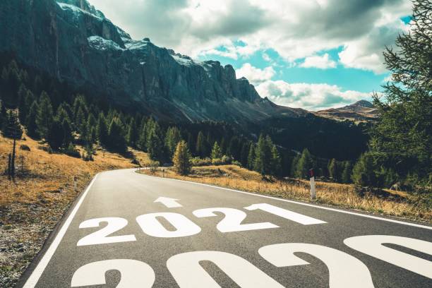 istock 2021 New Year road trip travel and future vision concept . 1285391083