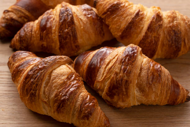 istock A croissant placed against a wooden background 1285397753