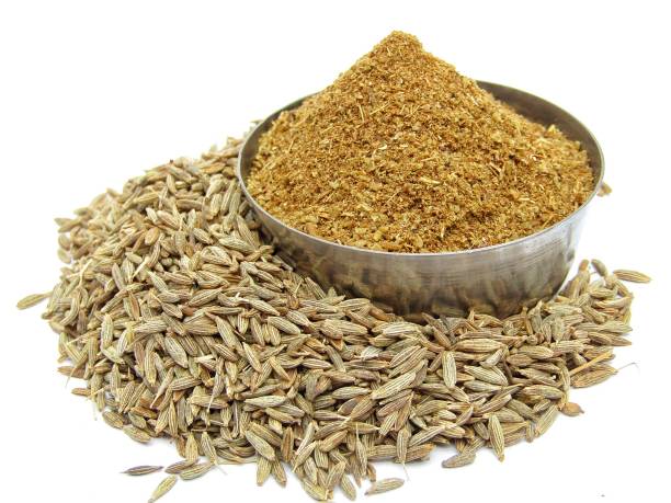istock Spices cumin seeds with powder on a white background 1285407774