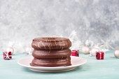 Traditional german christmas chocolate cake called tree cake, winter season sweets