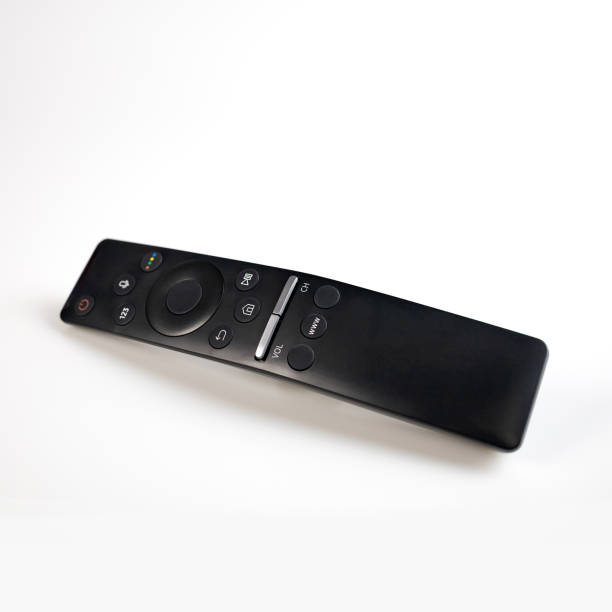 istock Modern TV remote control isolated on white background. Low angle view, minimalism. 1285416442