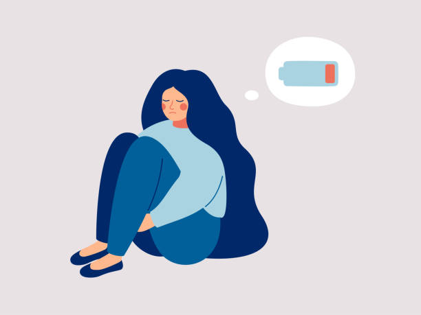 Tired woman sitting and hugging her knees with a discharged battery in the thoughts. Fatigued female is in emotional burnout or mental disorder. Tired woman sitting and hugging her knees with a discharged battery in the thoughts. Fatigued female is in emotional burnout or mental disorder. Vector illustration mental burnout stock illustrations