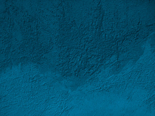istock Blue green stone background. Rough cement texture. Decorative plaster on a concrete wall. 1285429471