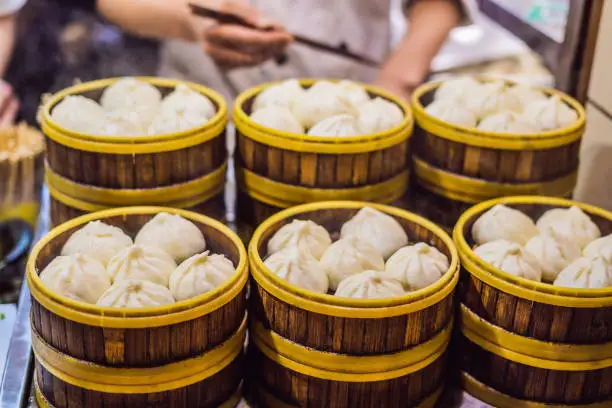 Photo of Street food booth selling Chinese specialty Steamed Dumplings in Beijing, China
