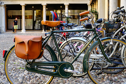 A vintage Pinarello bike is parked on a cobbled square in Treviso. This bicycle shows a lot of Italian elegance.