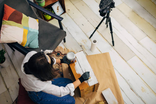 istock Craft woman using her free time during COVID-19 pandemic to record a tutorial for her DIY channel 1285435754