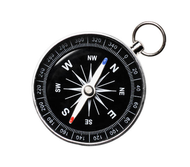 istock Metal Navigational Compass isolated on a white. Directly above 1285437412
