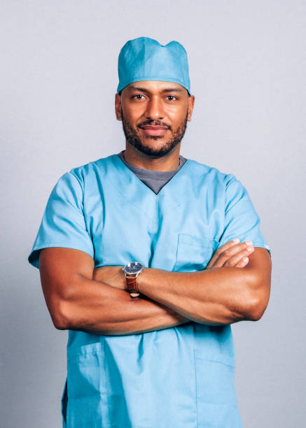 istock Confident male surgeon with arms crossed 1285440920
