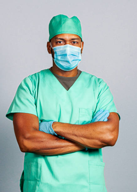 istock Male surgeon with arms crossed. 1285440925