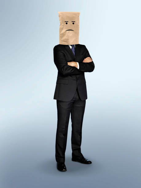 istock Sad businessman with paper bag over his head 1285441231