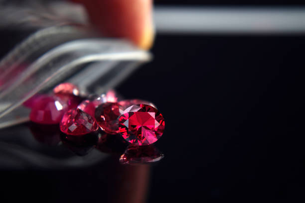 istock Spinel is a beautiful red gemstone lying on the ground. 1285442018
