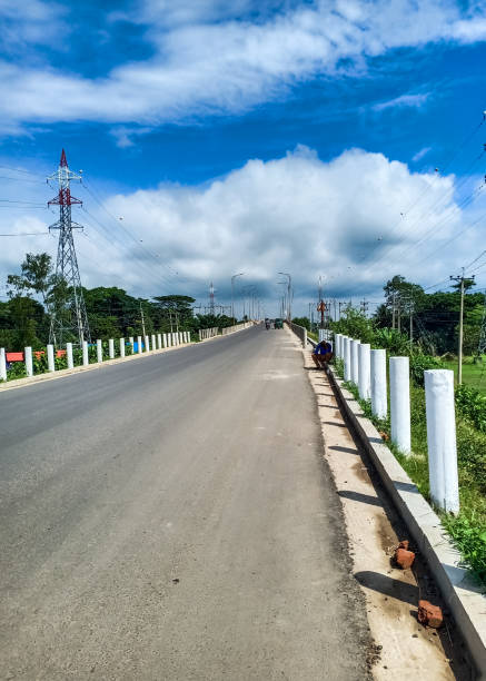 istock A beautiful village street under cloudy blue sky 1285443357