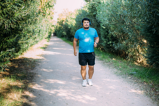 overweight Man running for weight loss