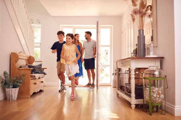 istock Family Looking Around New Home Before They Move In 1285448222