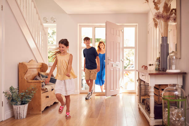 istock Family Looking Around New Home Before They Move In 1285450977